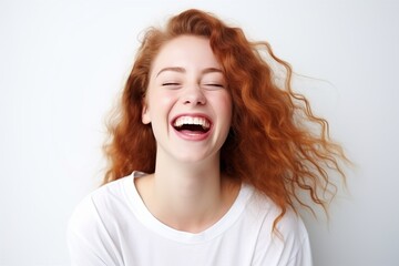 Young laughing woman on white background