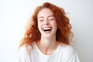 Young laughing woman on white background