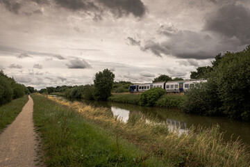 Fototapeta premium Train by the Canal