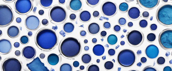 spot of shiny makeup blue eyeshadows on paper texture. dust smear on white background isolated template