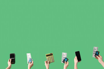 Women with credit cards, payment terminal, calculator and mobile phone on green background - obrazy, fototapety, plakaty