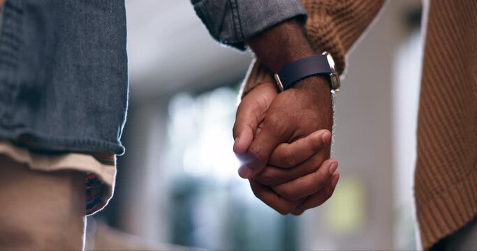 Closeup, holding hands and couple with support, queer and date with respect, marriage and romantic. Gay people, men and relationship with trust, hope and commitment with empathy, home and lgbtq