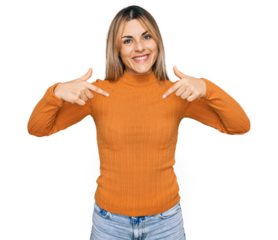 Young caucasian woman wearing casual clothes looking confident with smile on face, pointing oneself with fingers proud and happy.