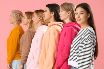 Beautiful women of different ages on pink background