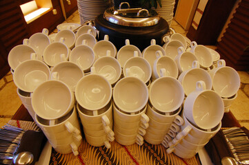 hundreds of white cups arranged neatly