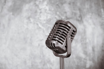 Classic Retro style microphone isolated on white background, dark tone.