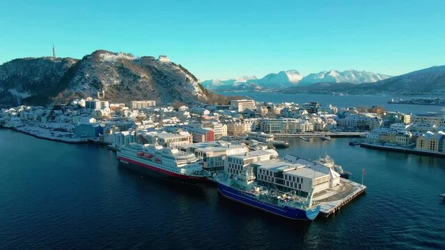Approaching ferry Hjorundfjord from Fjord 1 Company - Aerial view from Alesund Norway.
