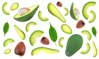 Falling avocados with green leaves isolated on a white background. Collection whole and half avocados.