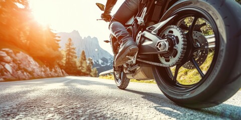 Modern motorbike on a road driving fast at a sunny day - obrazy, fototapety, plakaty
