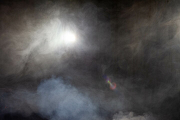 smoke in a dark room
