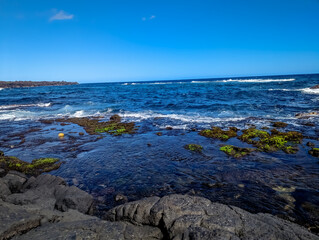 Fototapeta na wymiar Punaluu Black Sand Beach Hawaii