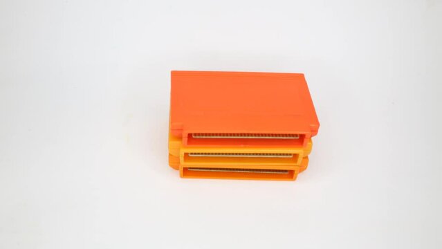 There are cartridges with computer games, are stacked