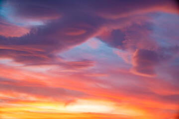 Spectacular sky at sunset with a great palette of warm colors ideal for backgrounds and textures