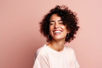 Laughing woman with curly hair