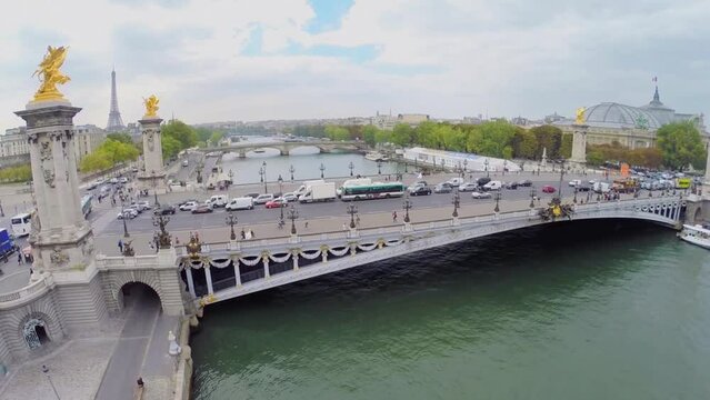 Transport traffic on Pont Alexandre lll at autumn day.