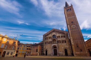 Obraz premium Baptistery and Cathedral is religious landmark of italian city Parma outdoors.