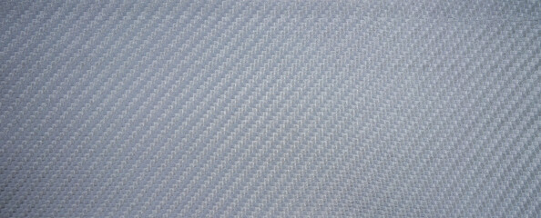 Photo of a gray carbon fiber texture.Carbon vinyl film for car tuning.Car detaling.