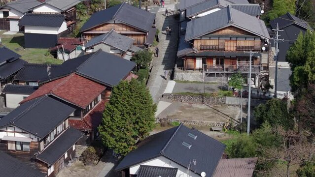 Aerial view of Magome, aka Magome-juku, during autumn season in Japan. Magome is a former post town on the Nakasendo trail, a major route that connected Tokyo with Kyoto in the feudal ages.