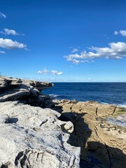 Rocky coast of the ocean. Bay and coastline. Rocky plateau forming a belvedere and offering a view...