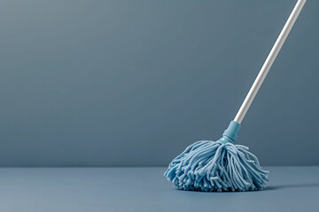 Mop for cleaning the floor, plain background - obrazy, fototapety, plakaty