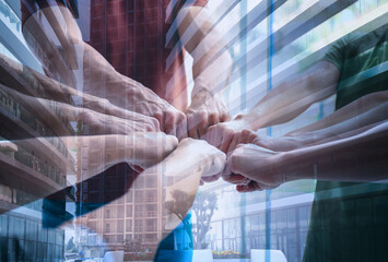 Partnership, cooperation, collaboration. Double exposure of buildings and people joining hands
