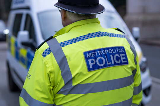 London, UK 14 January 2024. Police patrol in front of Buckingham Palace.