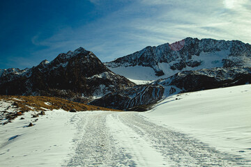 snowy mountain peaks seen from a snowmobile