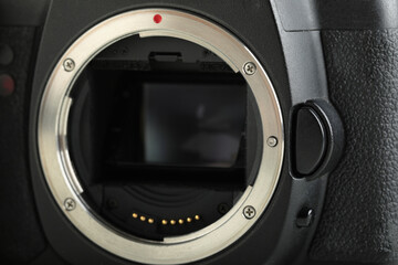 Big Black DSLR Digital Camera full frame sensor on white background.