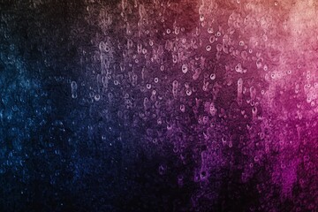Fototapeta premium An abstract background with a gradient of dark blue to purple and pink, overlaid with a texture resembling raindrops.
