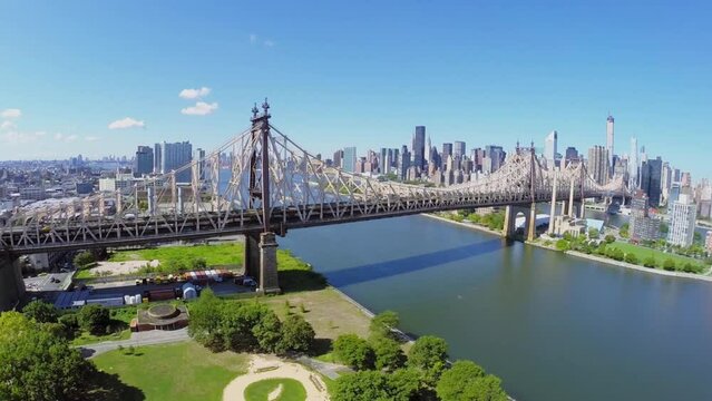 Cityscape with traffic on Queensboro Bridge and Manhattan skyscrapers