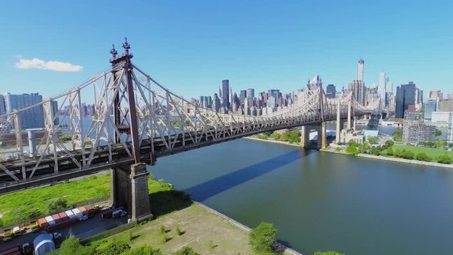 Queens Bridge with traffic at summer sunny day in New-York City