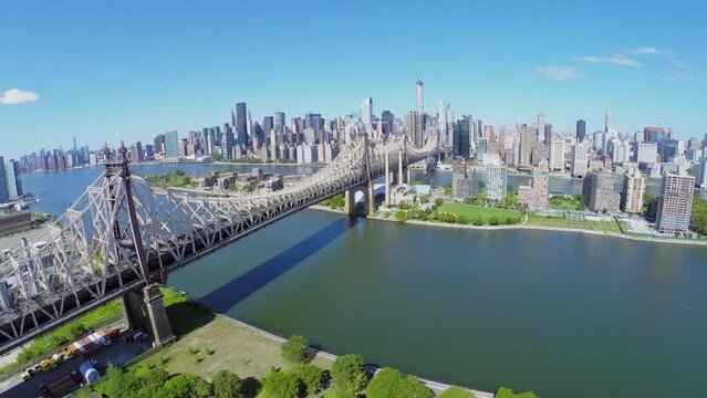 Queensboro Bridge with traffic at summer sunny day 