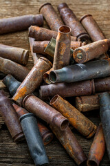 Close-Up 4K Ultra HD Image of Old Rusted Empty Shell Casings - Historical Artifacts