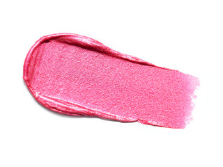 Pink shimmering lipstick texture stroke isolated on white background. Cosmetic product swatch