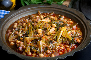 Spinach head dish or spinach head soup. It is a local dish. This dish, which is made in Adana, Turkey, is also sour. Turkish name; ispanak basi corbasi or yemegi