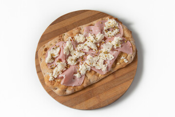 A piece of a traditional pizza of the Roman tradition, known as Pinsa Romana,with Mortadella of Bologna, mozzarella cheese Pistacchio grains, vision from above on white background and cutting board