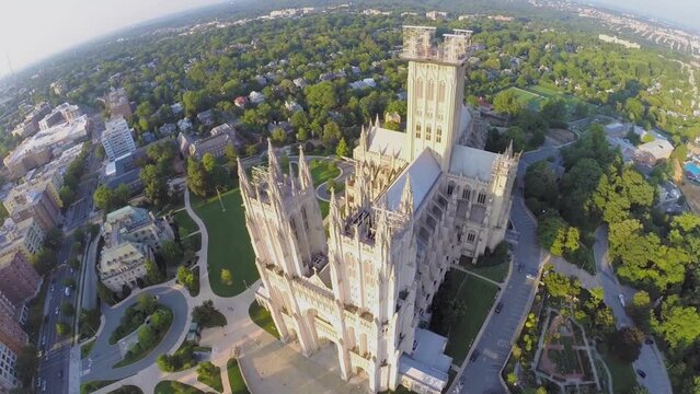 City traffic near Washington National Cathedral lit by sunlight