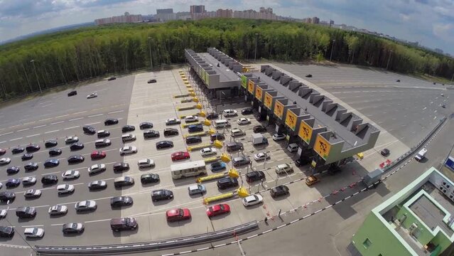 Car traffic on chargeable road near fee station 