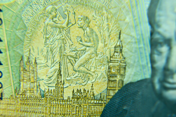 London, UK, 2 January 2024: British five pounds sterling banknote  closeup with selective focus....