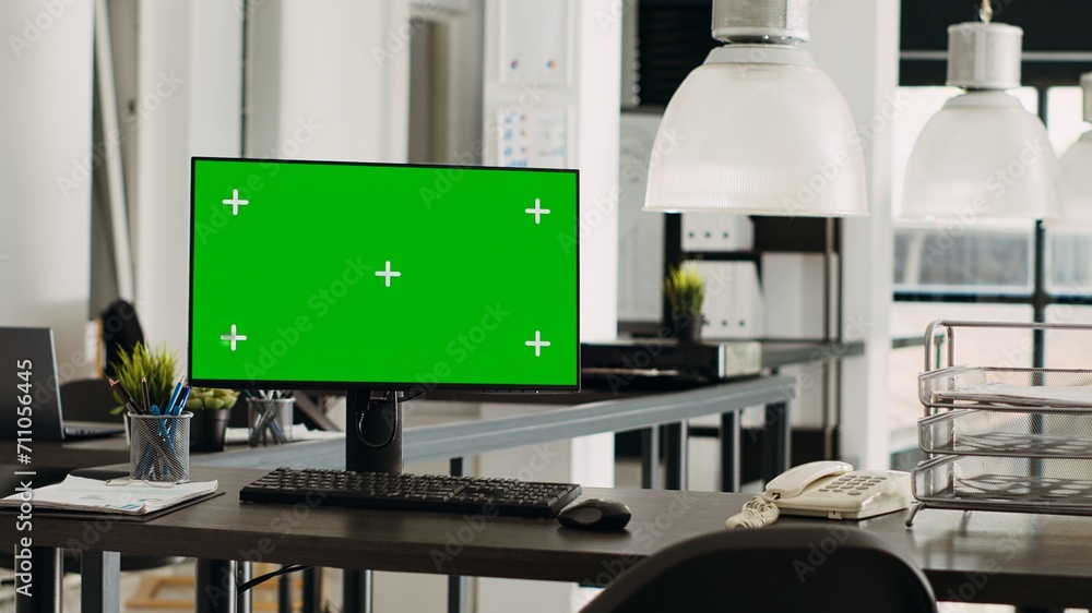 Poster empty office with greenscreen on computer display, marketing agency open floor plan. coworking space