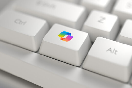 Colored Copilot AI key on a white computer keyboard, close-up. Dedicated keyboard key for Copilot AI. Pavlodar, Kazakhstan - January 11, 2024