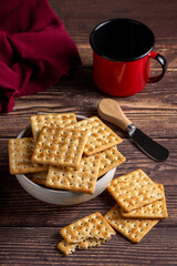 Crispy crackers in bowl. Crispy dry biscuits.