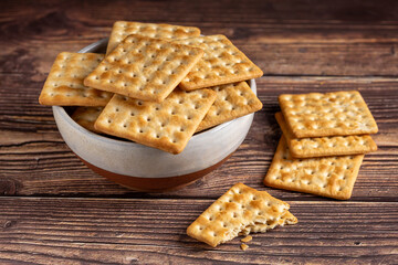 Crispy crackers in bowl. Crispy dry biscuits.