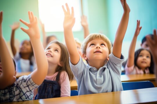 eager students raising hands in classroom