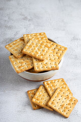 Crispy crackers in bowl. Crispy dry biscuits.