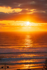 Fototapeta premium Golden Sunrise Over Gold Coast Beach