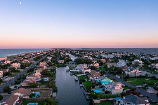 Aerial View of a Canal in Sandbridge with Back Bay and the Atlantic Ocean on Either Side Virginia Beach