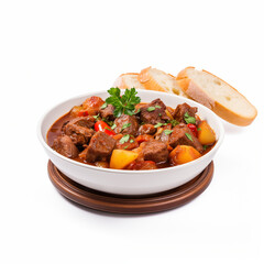Goulash, Hearty stew made with  beef meat, and seasoned with paprika and other spices