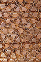 Islamic style geometric carving detail with intricate star shapes