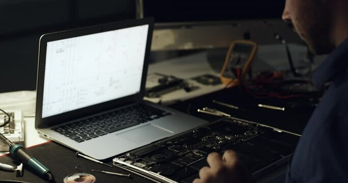 Motherboard, laptop and man repair hardware, electronics or problem solving semiconductor in maintenance check. Night, mockup screen space and person upgrade computer system, CPU circuit or fixing PC